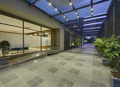 Night view of entrance walkway at Karma Workspaces, Ahmedabad